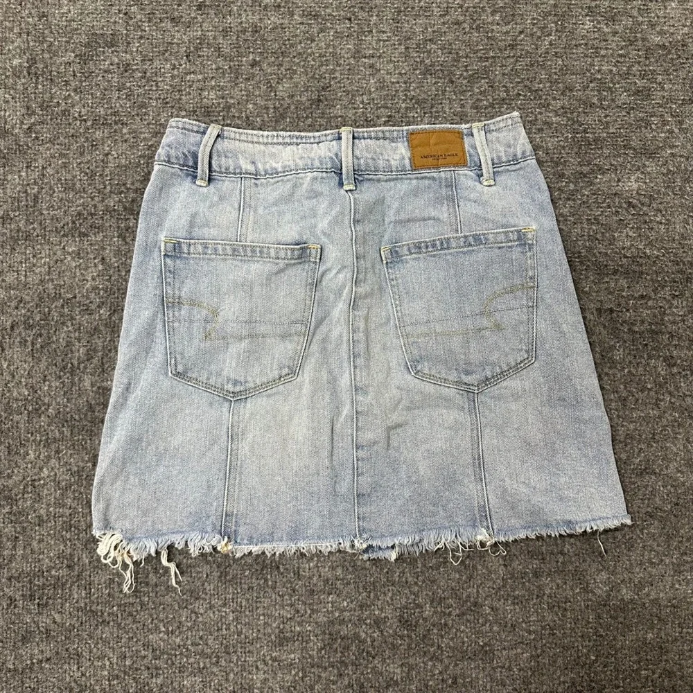 American Eagle Skirt Womens Size 2 Light Wash Denim Distressed Button Fly Mini